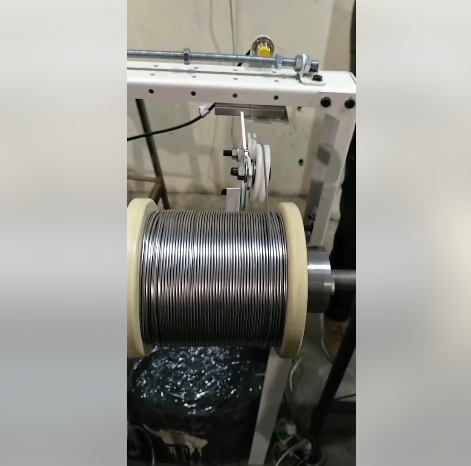 Machine for winding and coiling files